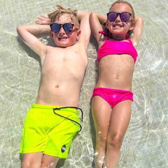 Beach Vacation Packing List for Kids: From Sand Toys to Rash Guards - Tuck & Char Co.