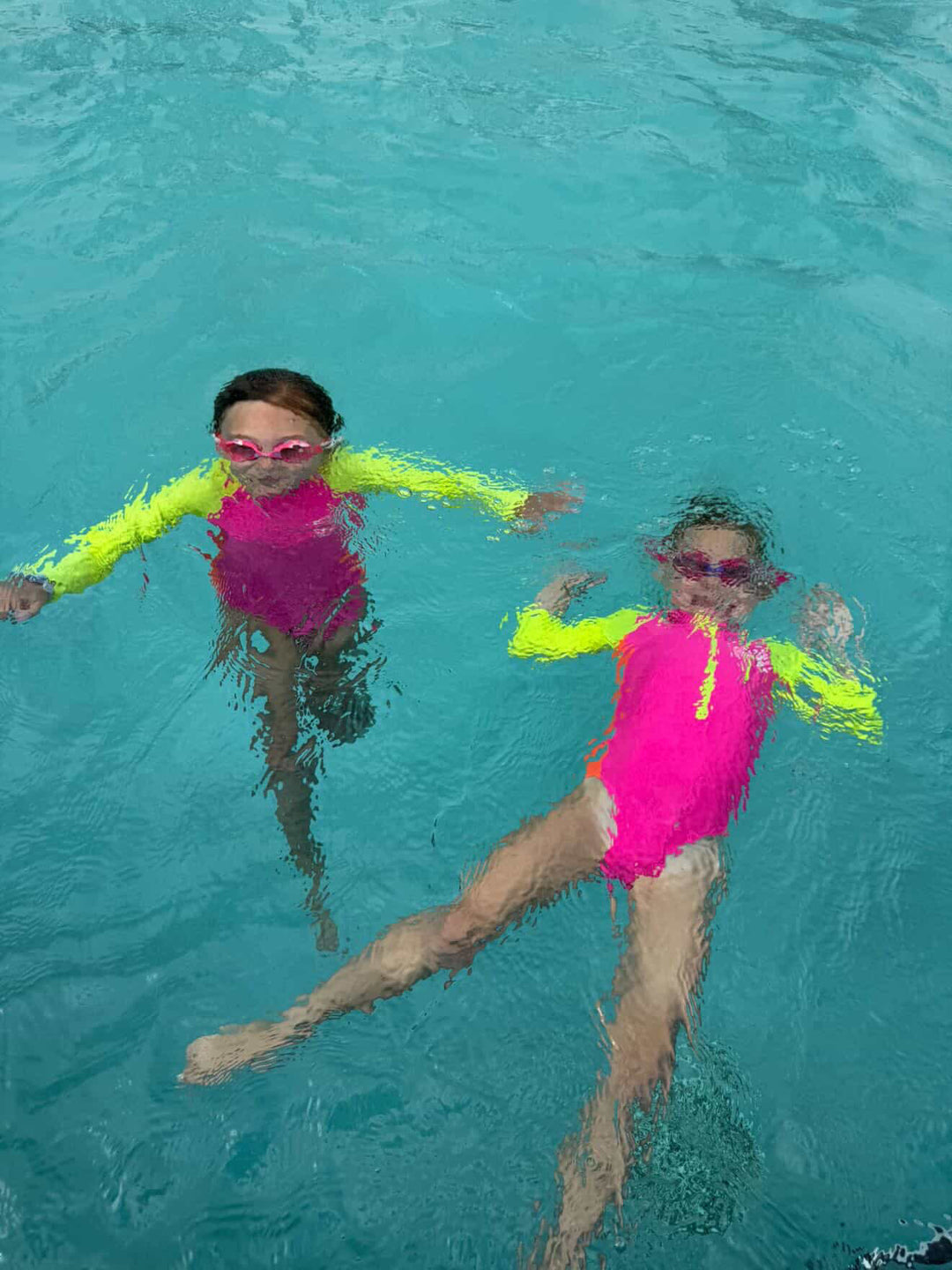 UPF 50+ Neon Pink Color Block Girls One Piece Long Sleeve Swimsuit
