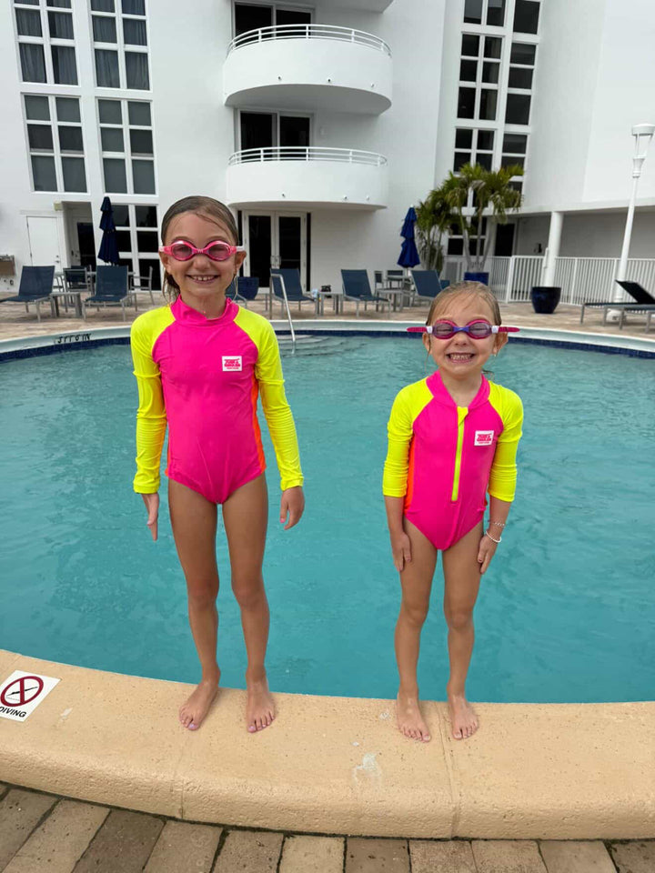 UPF 50+ Neon Pink Color Block Girls One Piece Long Sleeve Swimsuit