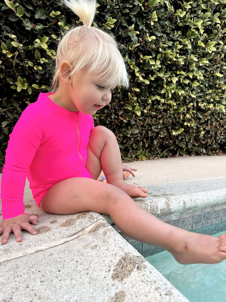 Hi-Viz Neon Pink Girls One Piece Long Sleeve Swimsuit - Tuck &amp; Char Co.