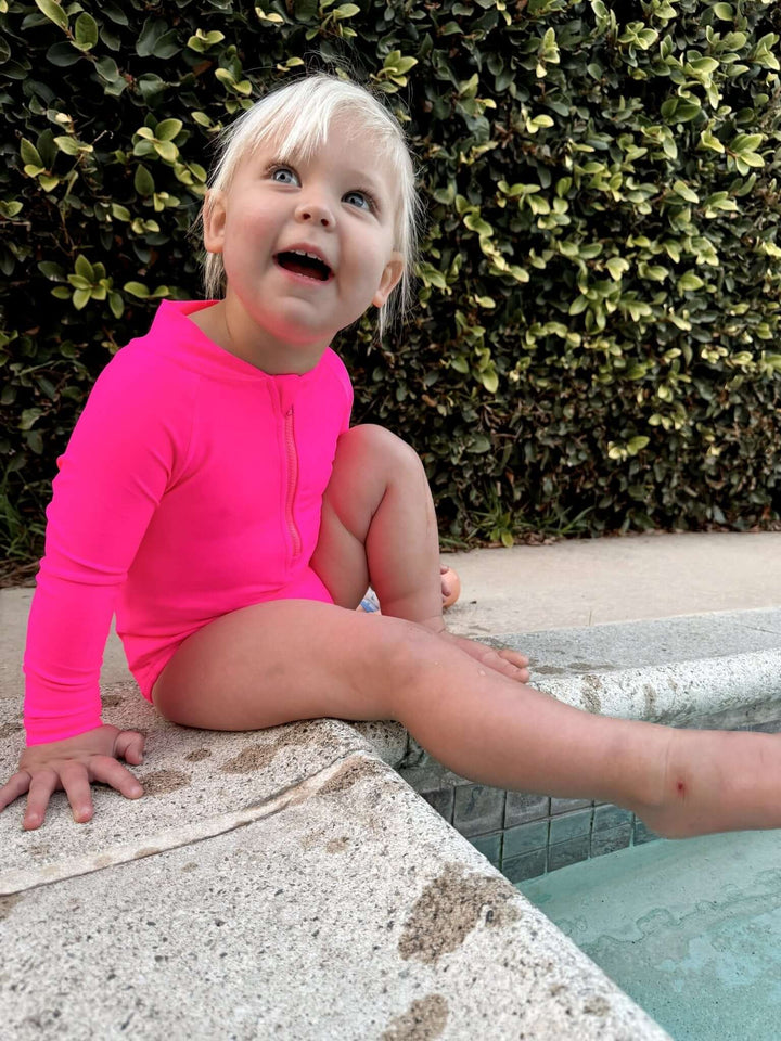 Hi-Viz Neon Pink Girls One Piece Long Sleeve Swimsuit - Tuck &amp; Char Co.