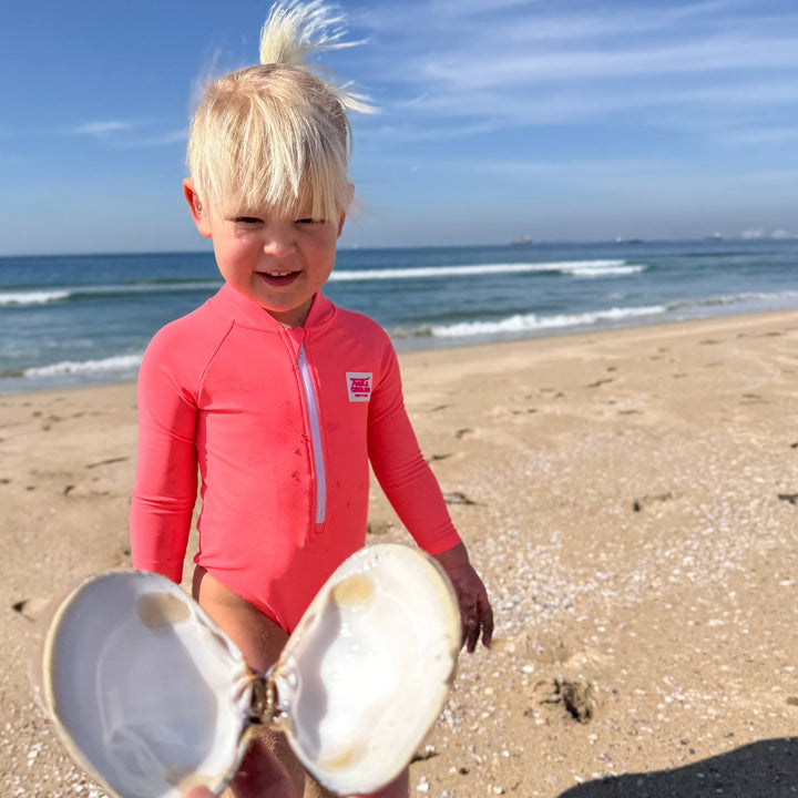 UPF 50+ Neon Coral Girls One Piece Long Sleeve Swimsuit - Tuck &amp; Char Co.