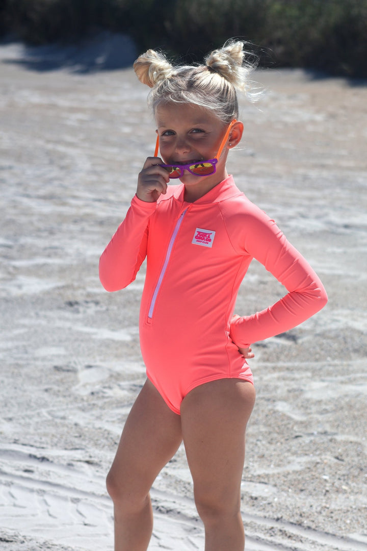 UPF 50+ Neon Coral Girls One Piece Long Sleeve Swimsuit - Tuck &amp; Char Co.