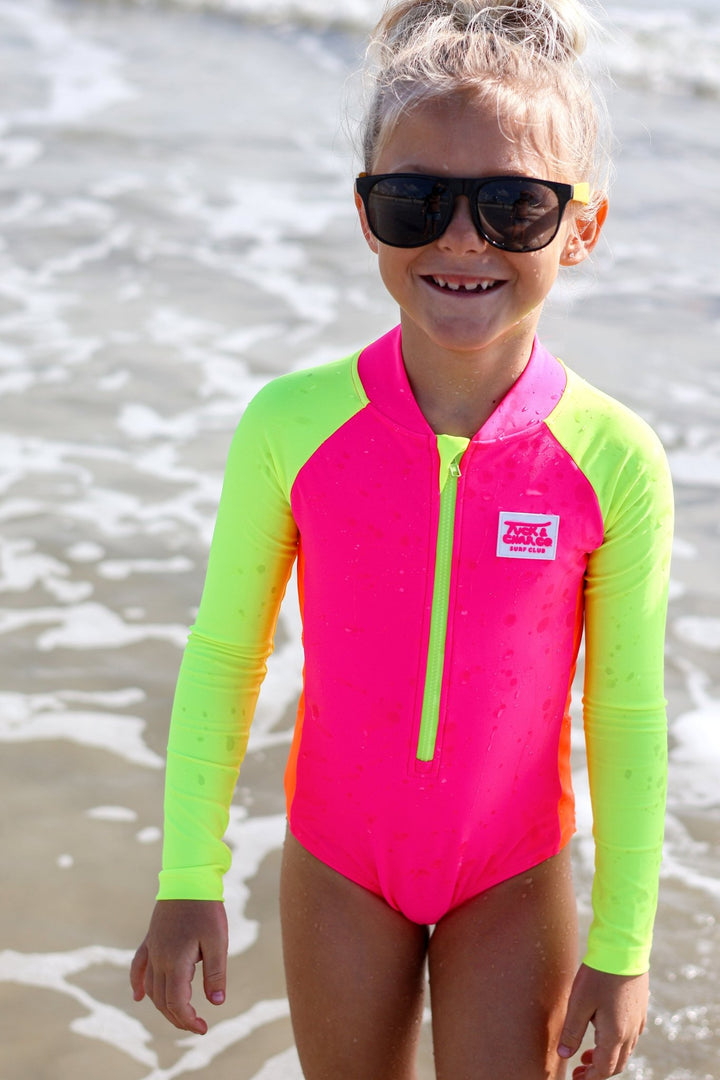 UPF 50+ Neon Pink Color Block Girls One Piece Long Sleeve Swimsuit - Tuck &amp; Char Co.