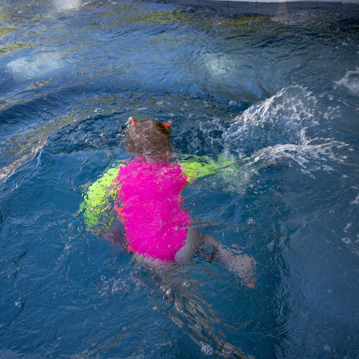 UPF 50+ Neon Pink Color Block Girls One Piece Long Sleeve Swimsuit - Tuck &amp; Char Co.