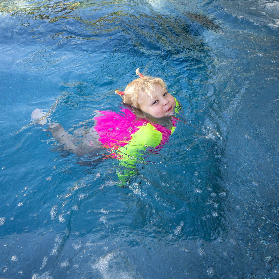 UPF 50+ Neon Pink Color Block Girls One Piece Long Sleeve Swimsuit - Tuck &amp; Char Co.