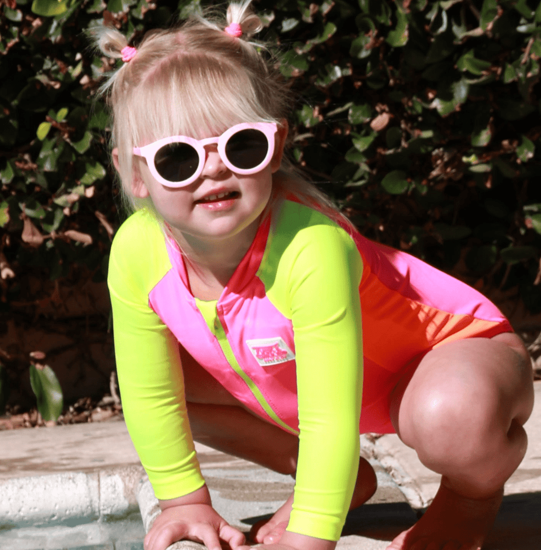 UPF 50+ Neon Pink Color Block Girls One Piece Long Sleeve Swimsuit - Tuck &amp; Char Co.