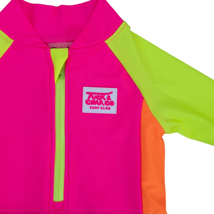 UPF 50+ Neon Pink Color Block Girls One Piece Long Sleeve Swimsuit - Tuck &amp; Char Co.