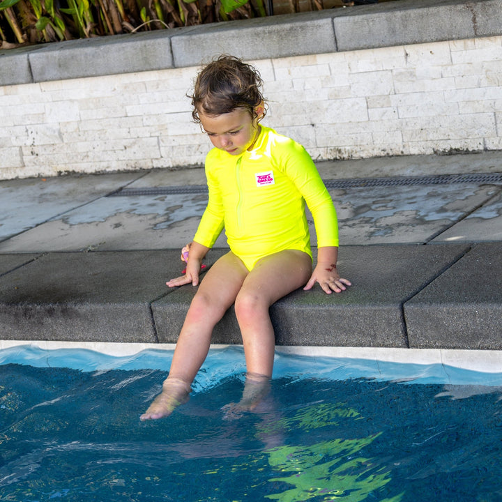 UPF 50+ Neon Yellow Girls One Piece Long Sleeve Swimsuit - Tuck &amp; Char Co.