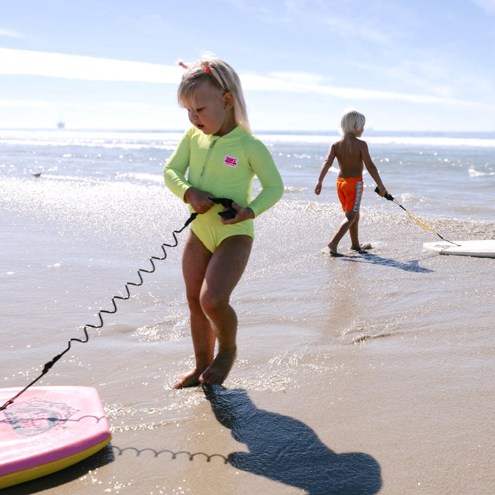UPF 50+ Neon Yellow Girls One Piece Long Sleeve Swimsuit - Tuck &amp; Char Co.