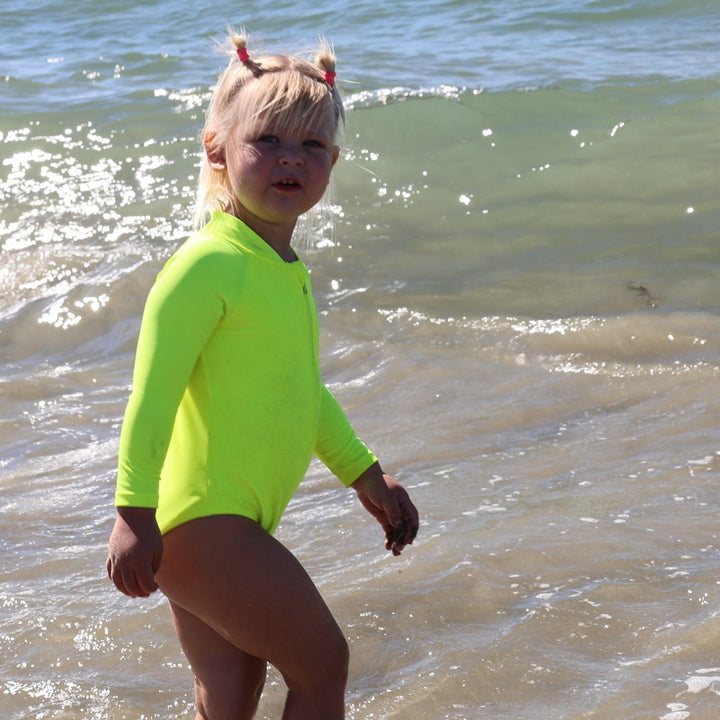 UPF 50+ Neon Yellow Girls One Piece Long Sleeve Swimsuit - Tuck &amp; Char Co.