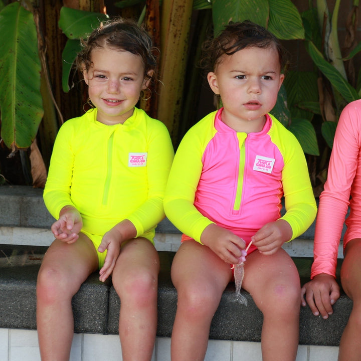 UPF 50+ Neon Yellow Girls One Piece Long Sleeve Swimsuit - Tuck &amp; Char Co.