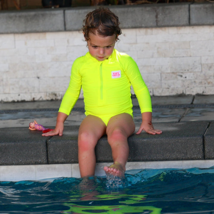 UPF 50+ Neon Yellow Girls One Piece Long Sleeve Swimsuit - Tuck &amp; Char Co.